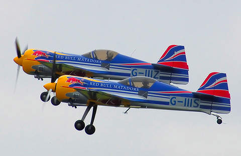 The Su-26M Red Bull Matadors taking off from Kemble Airport in Gloucestershire, England, in 2008.