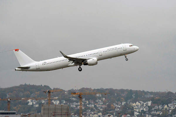 The Sharklets-equipped A321 aircraft performs its first flight.