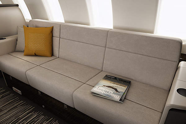 The Challenger 650’s cabin can accommodate up to 12 passengers and offers stand-up headroom, larger seats, additional leg room and a flat floor throughout. Credit: Bombardier.