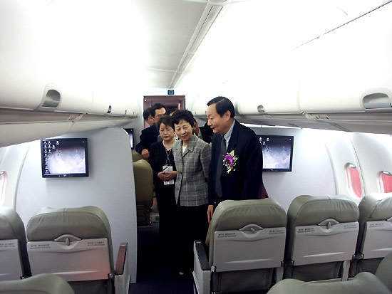 The first-class seats are arranged four seats to a row, with a typical 38in pitch. The tourist-class seats are arranged five seats to a row, with a pitch of 32in.