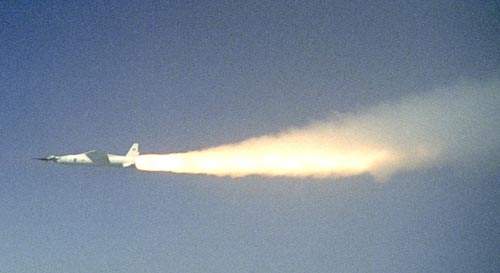 In March 2004 over the Pacific Ocean, the modified Pegasus rocket motor ignites after release from the B-52B aircraft, beginning the acceleration of the X-43A vehicle.